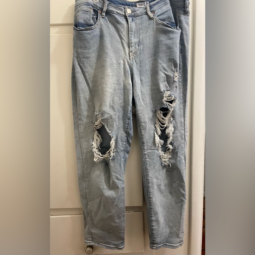 Rip baggy blue jeans